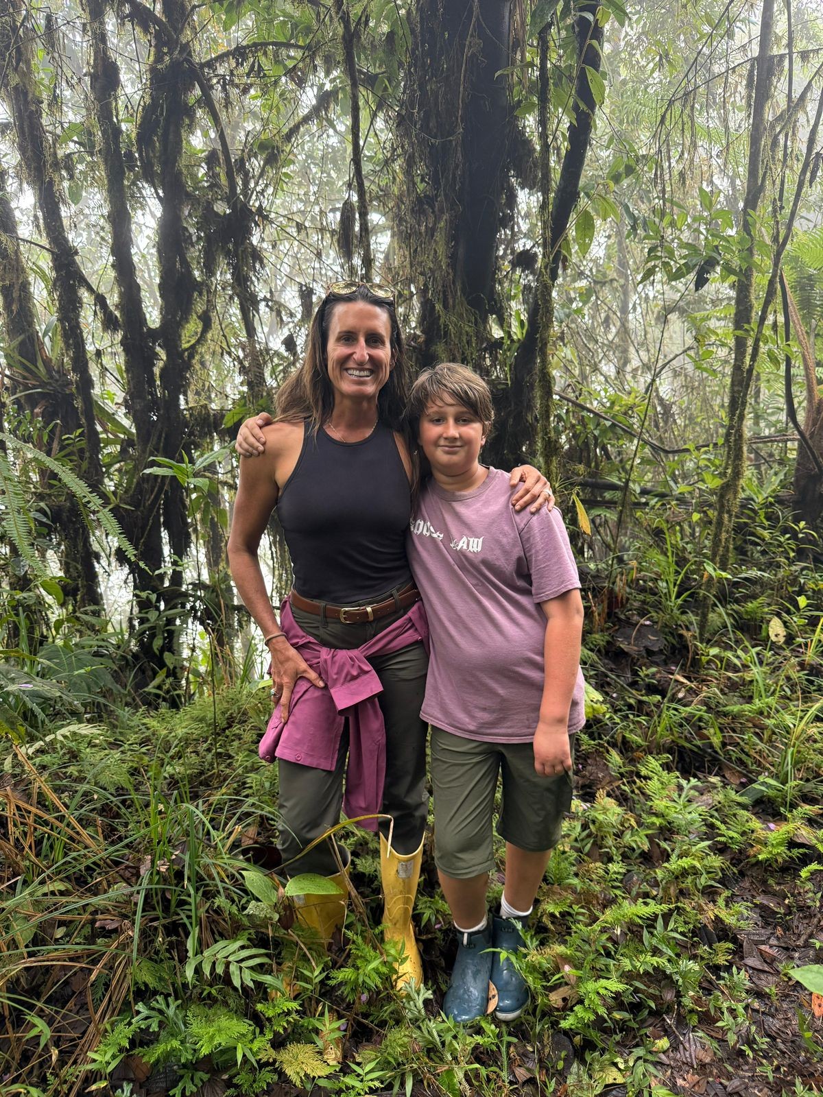 Mother and son exploring the cloud forest at La Hesperia